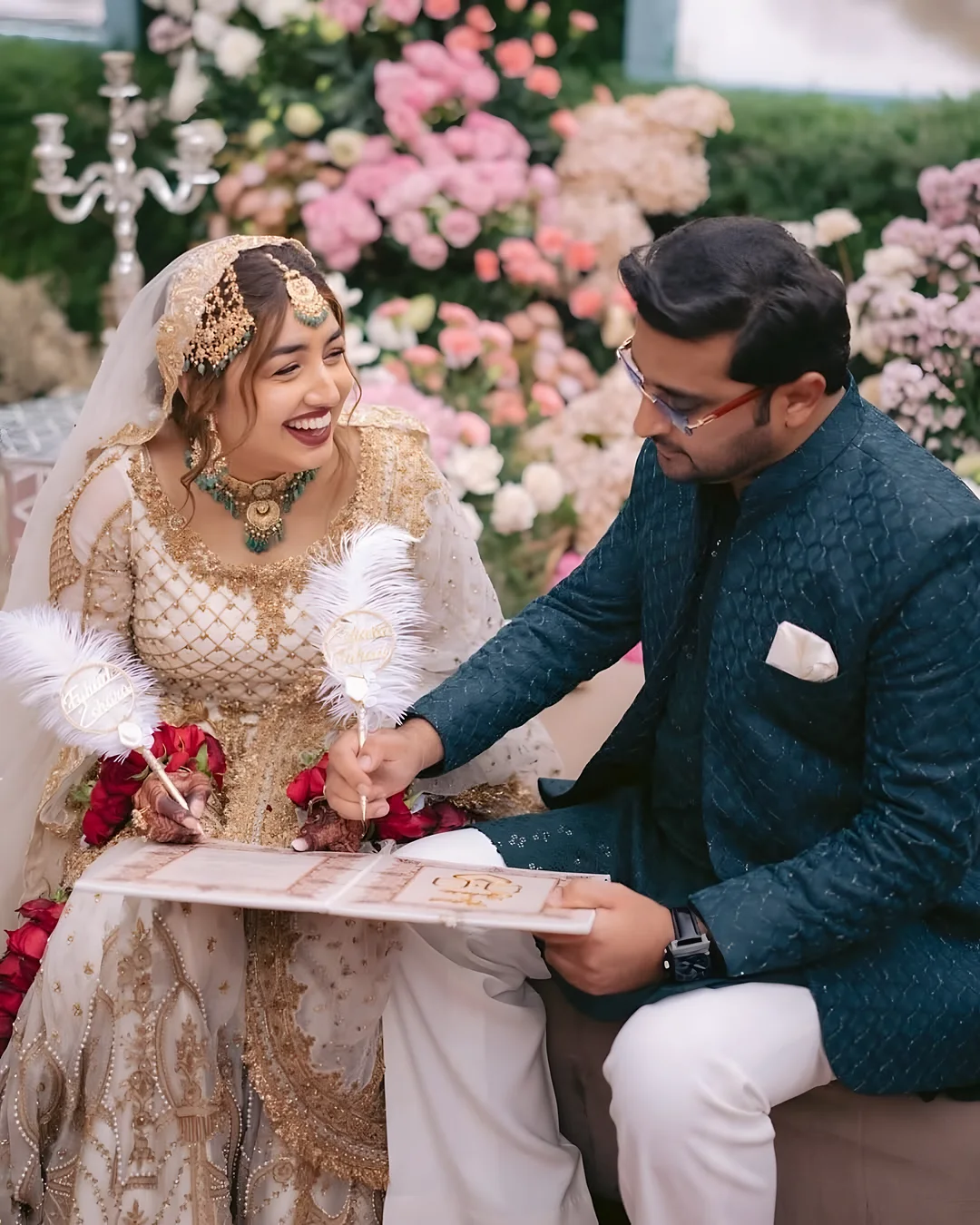 Couple signing the nikah