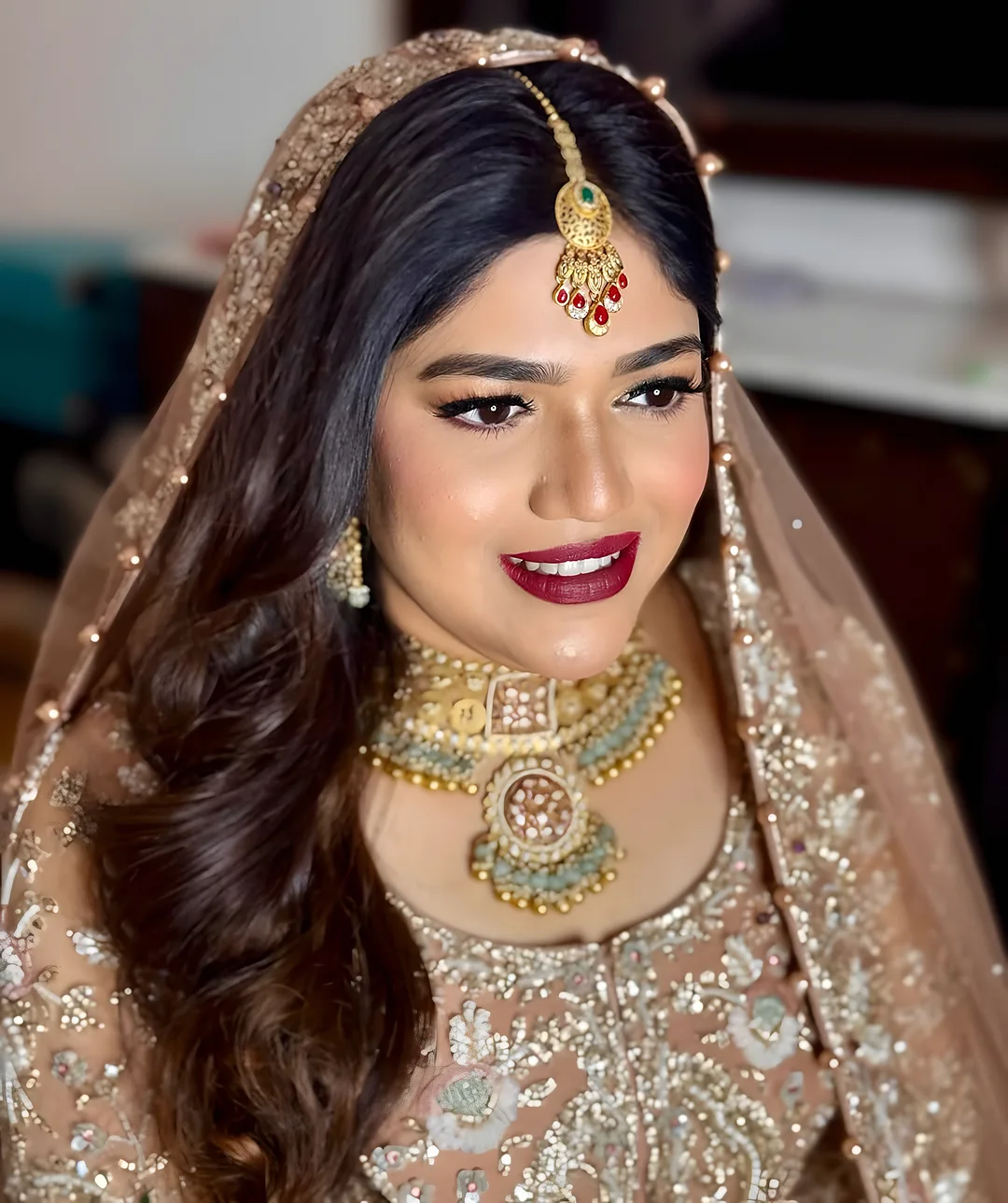 Smiling bride in gold