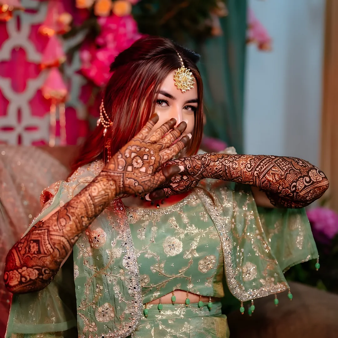Laughing bride at her mehndi