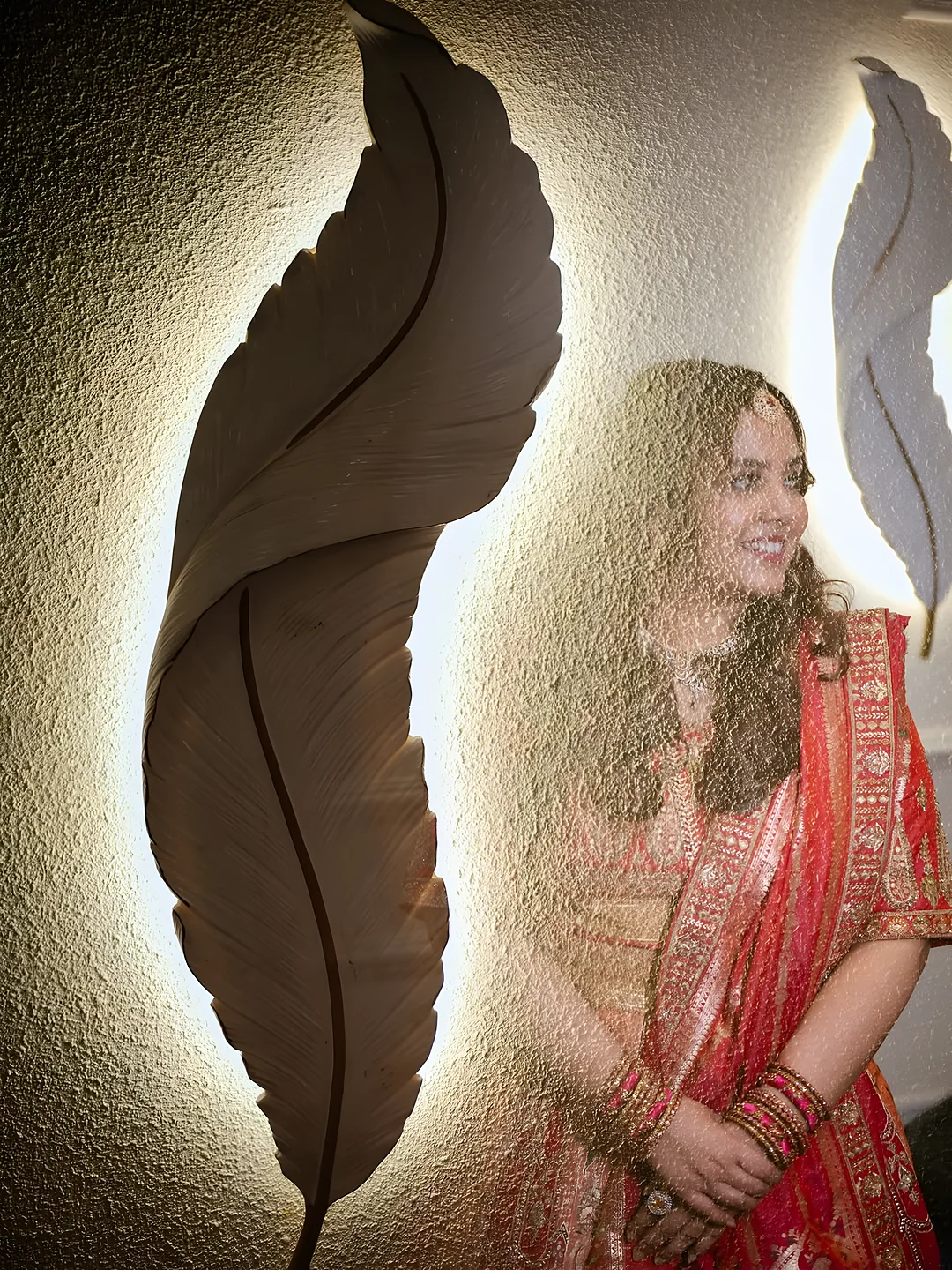 Bride glowing against a lit wall